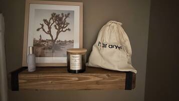 Hair dryer, towels, soap, shampoo