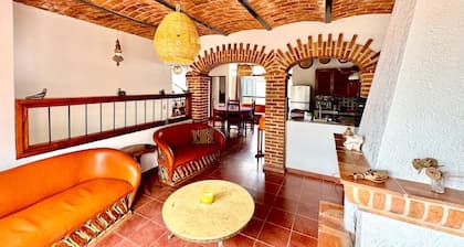 Stay in the center of Ajijic. Enjoy a rooftop with a view.