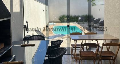 House with pool and pool table.