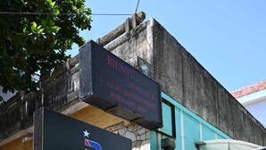 A sign for PRAKASH Residence with rooms available, offering A/C, free WiFi, and Smart TV. - Prakash Residence (Puducherry)