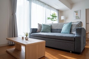 Suite familiale | Aire de séjour | Téléviseur à écran plat de 40 po avec télévision numérique