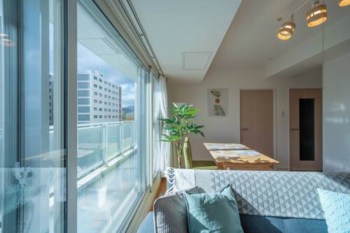 Family Suite | Living area | 40-inch flat-screen TV with digital channels