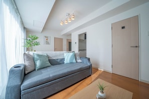Family Suite | Living area | 40-inch flat-screen TV with digital channels - Sapporo irios cozy inn (Sapporo)