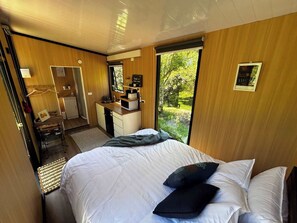 1 bedroom, bed sheets - Kereru Creek by Tiny Away (Tataraimaka)