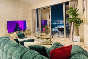 Luxury Apartment, 2 Bedrooms, Park View | Living room | 45-inch Smart TV with digital channels - One Lux Stay Grande Signature Residences (Dubai)