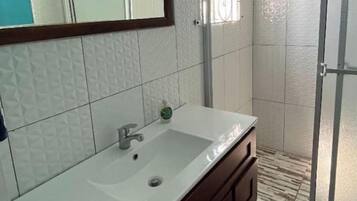 Shower, towels, toilet paper