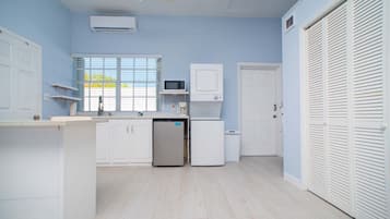 Microwave, coffee/tea maker, toaster, cookware/dishes/utensils