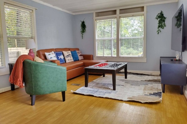 Game night, anyone? Kick back on the pull-out sofa (sleeps 1 adult or 2 kids), enjoy a movie on the big Roku TV, or challenge friends to a checkers match. Plush seating and blankets make it oh-so-cozy!