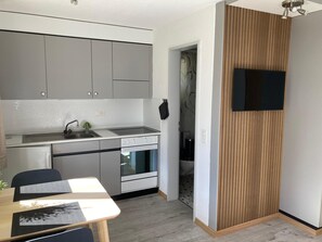 Fridge, microwave, stovetop, coffee/tea maker