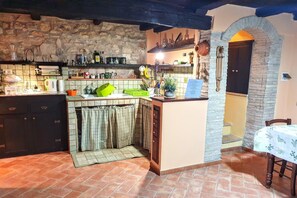 Fridge, stovetop, dining tables