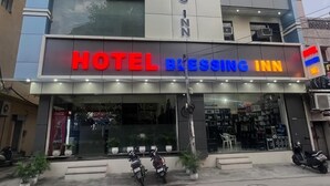 A multi-story building with a sign reading "HOTEL BLESSING INN". - Hotel Blessing Inn (Jalandhar)
