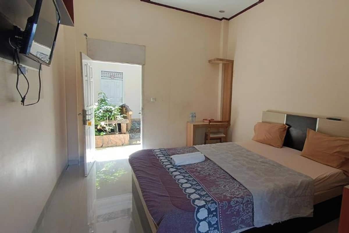 Quarto standard | Escrivaninha, Wi-Fi de cortesia, roupa de cama