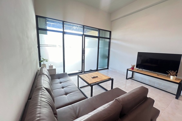 2 Bedrooms House | Living area | 32-inch Smart TV with satellite channels