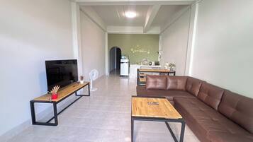 2 Bedrooms House | Living area | 32-inch Smart TV with satellite channels