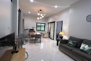 2 Bedrooms Superior Villa | Living area | 24-inch flat-screen TV with cable channels