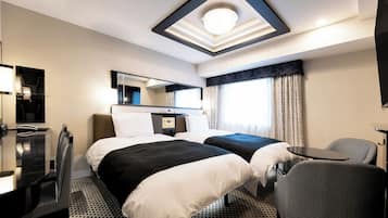 Down duvets, desk, blackout curtains, iron/ironing board