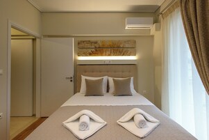 Family Apartment | 2 bedrooms, hypo-allergenic bedding, in-room safe, blackout drapes