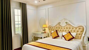 Premium bedding, memory foam beds, in-room safe, laptop workspace