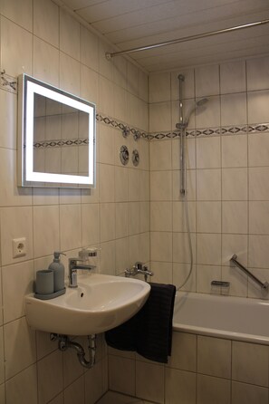 Hair dryer, towels, soap, shampoo