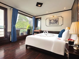 Premium bedding, desk, laptop workspace, soundproofing