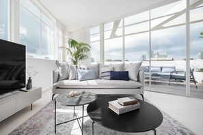 Luxury Penthouse | Living area | 65-inch Smart TV with cable channels, fireplace, Netflix - KG4 LUX Apartments (Tel Aviv)