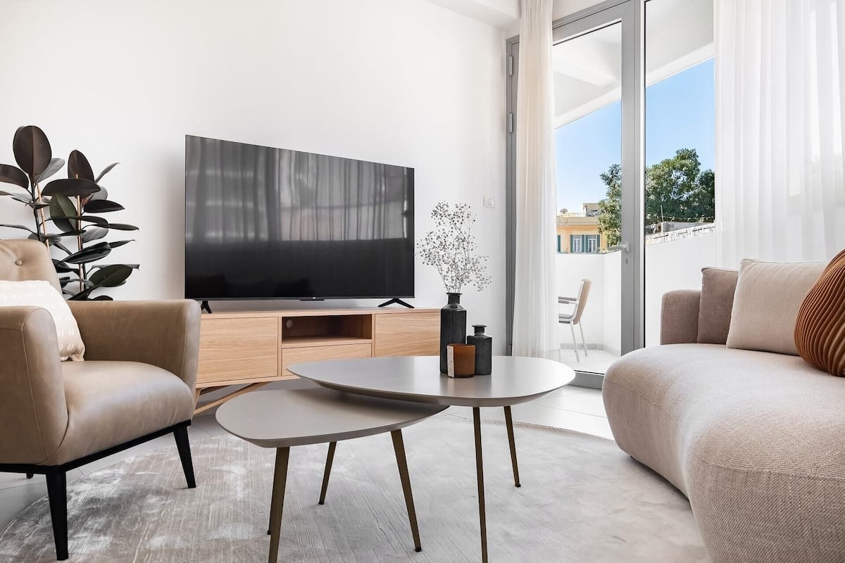 Apartment, 3 Bedrooms, Balcony | Living area | 65-inch Smart TV with cable channels, fireplace, Netflix
