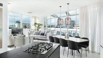 Luxury Penthouse | Living area | 65-inch Smart TV with cable channels, fireplace, Netflix