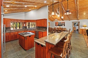 Fridge, microwave, oven, stovetop - Angels View Chalet: Spectacular 6 Bedroom Luxury Cabin w/ Incredible Amenities! PET FRIENDLY! HOT TUB! EV Charger! Amazing Game Room w/ Pool Table! Foosball Table! Peaceful Mountain Setting & Sprawling Open Floor Plan! (Big Bear City)