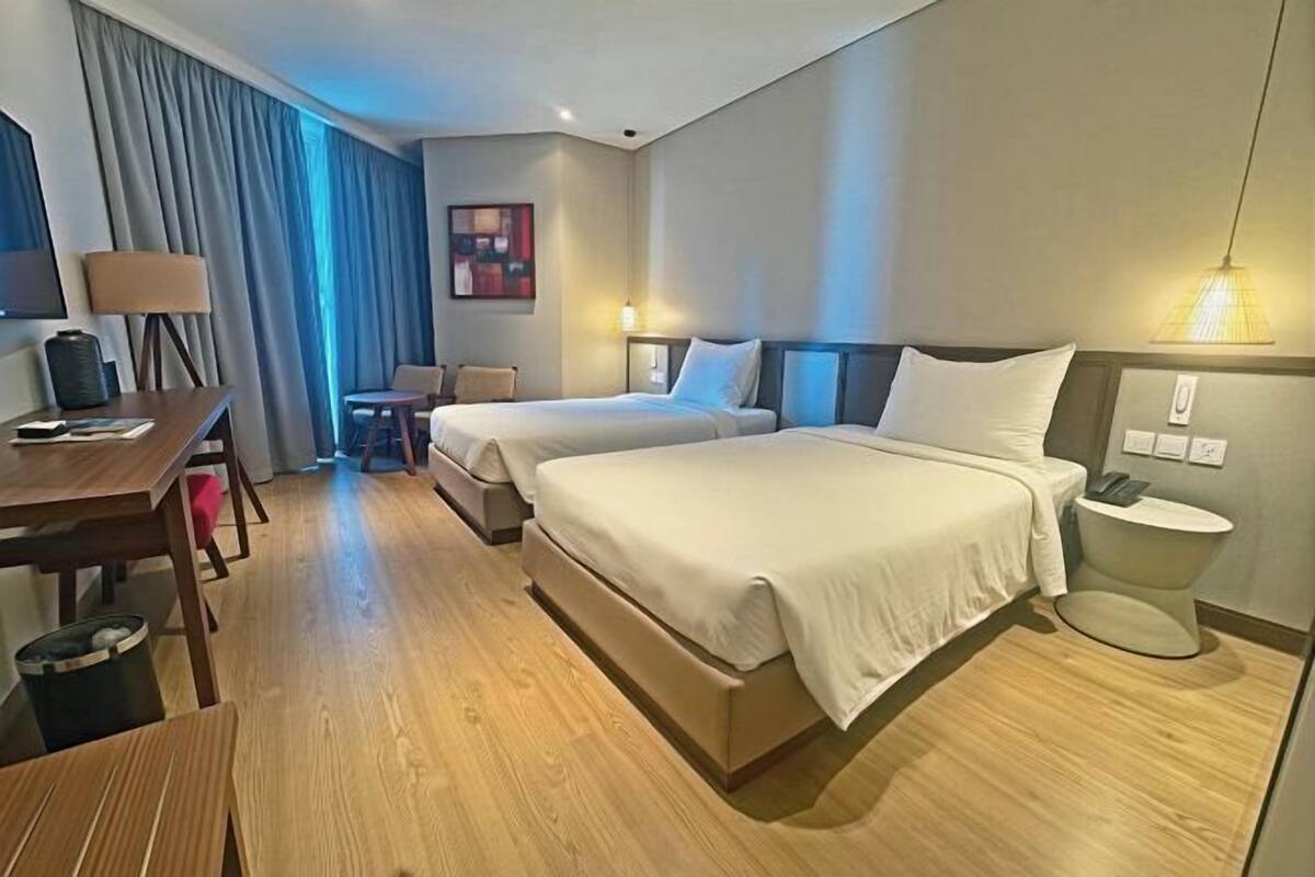 Memory-foam beds, minibar, desk, laptop workspace