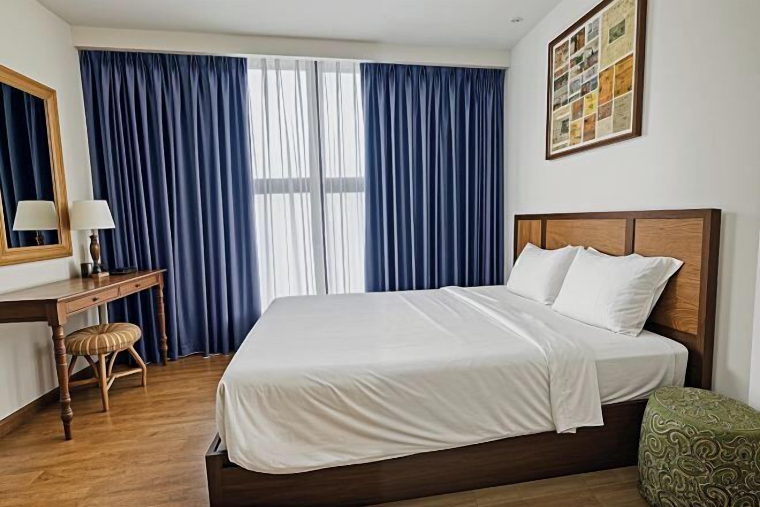 Memory-foam beds, minibar, desk, laptop workspace