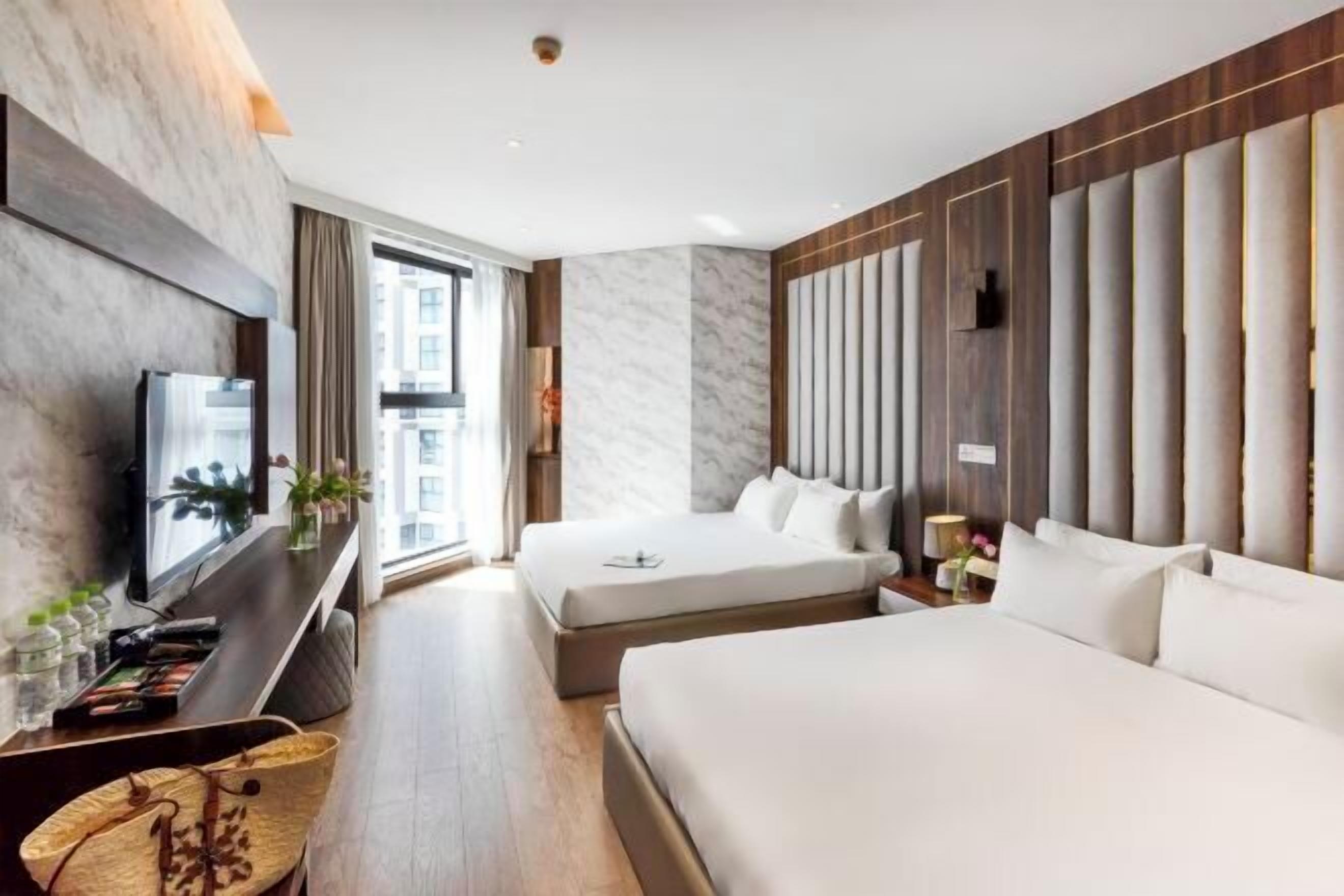 Memory-foam beds, minibar, desk, laptop workspace