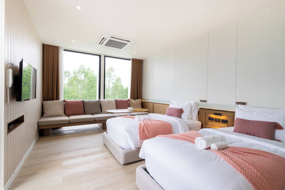 Deluxe Twin Room | โต๊ะทำงาน, Wi-Fi ฟรี, ผ้าปูที่นอน
