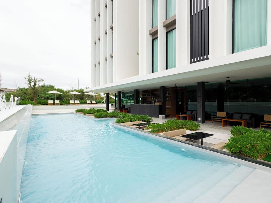 Outdoor pool, open 7:00 AM to 10:00 PM, pool loungers