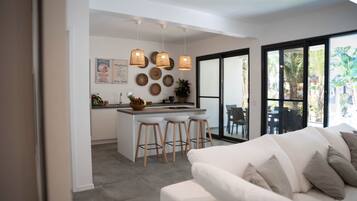 Deluxe Villa, Patio | In-room safe, desk, laptop workspace, iron/ironing board