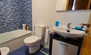 Hair dryer, bidet, towels, soap