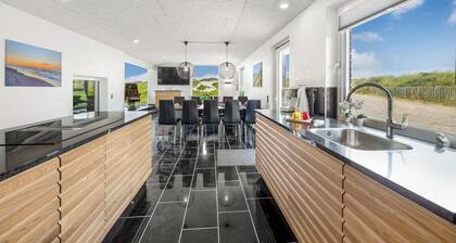 Family-friendly holiday home with indoor pool and outdoor spa 100 meters from.