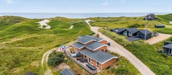 Family-friendly holiday home with indoor pool and outdoor spa 100 meters from.
