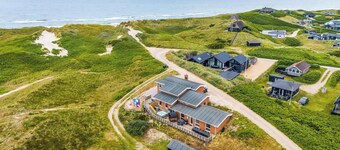 Family-friendly holiday home with indoor pool and outdoor spa 100 meters from.