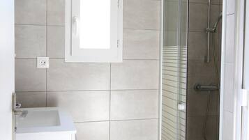 Shower, towels, toilet paper