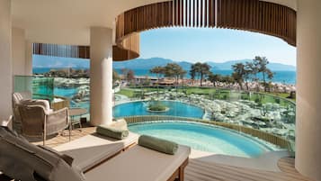 Signa Family Suite | Pool | Indoor pool, seasonal outdoor pool, pool umbrellas, sun loungers