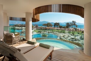 Signa Family Suite | Pool | Indoor pool, seasonal outdoor pool, pool umbrellas, sun loungers