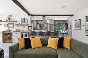 TV, fireplace - Casa Puerta Verde – Spanish-Style Palm Springs Retreat with Pool, Casita, Spa & Outdoor Kitchen (Palm Springs)