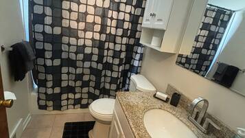 Hair dryer, towels, soap, shampoo