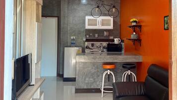 Deluxe Apartment, Non Smoking, Balcony | Living area