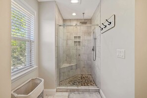 Shower, hair dryer, towels, shampoo