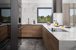 Luxury Apartment, Non Smoking, Sea View | Private kitchen | Full-size fridge, microwave, oven, stovetop