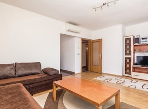 Apartment (Three Bedroom Apartment with Sea View) | Living room | 32-inch flat-screen TV with satellite channels