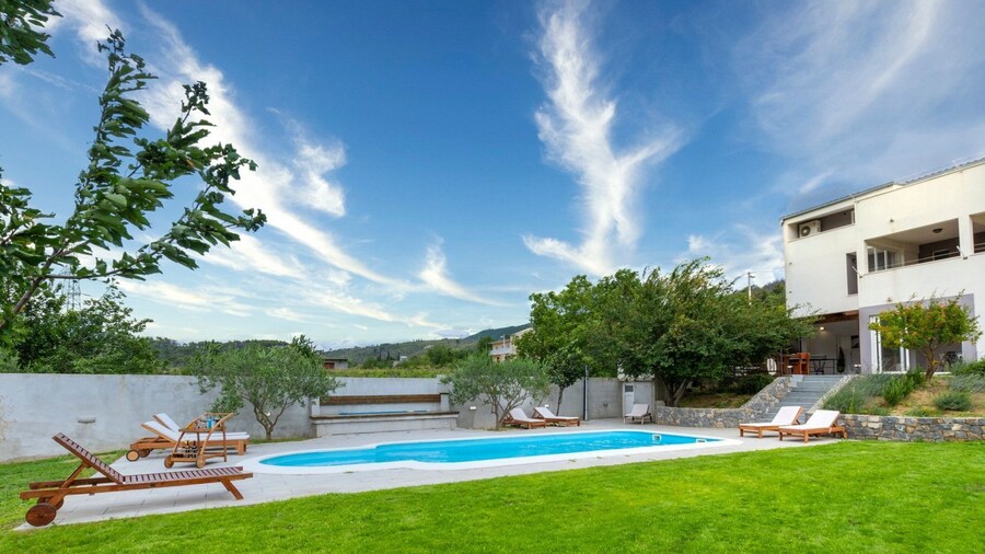 Serene Rural Villa With Pool, Sun Deck, and Children's Play Area