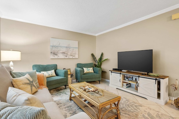 Stream all your favorite entertainment in the comfy coastal living room