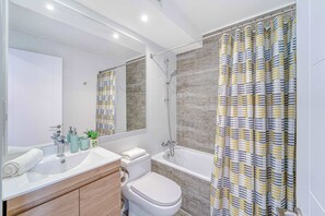 Shower, hair dryer, towels